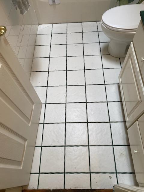Bathroom #4 Floor - Before