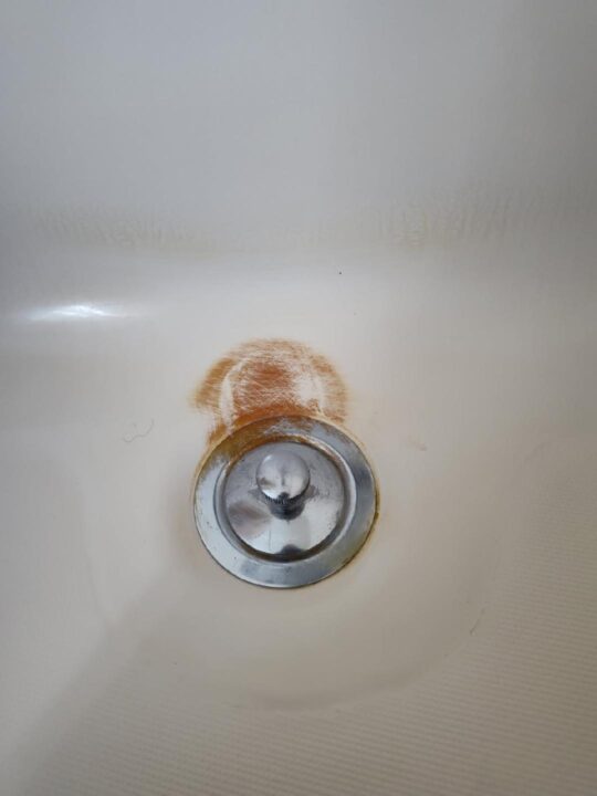 Rust Removal on Drain - Before
